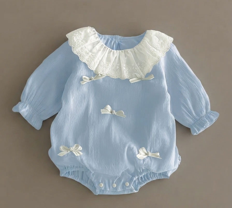 Celeste Bow Accent Onesie