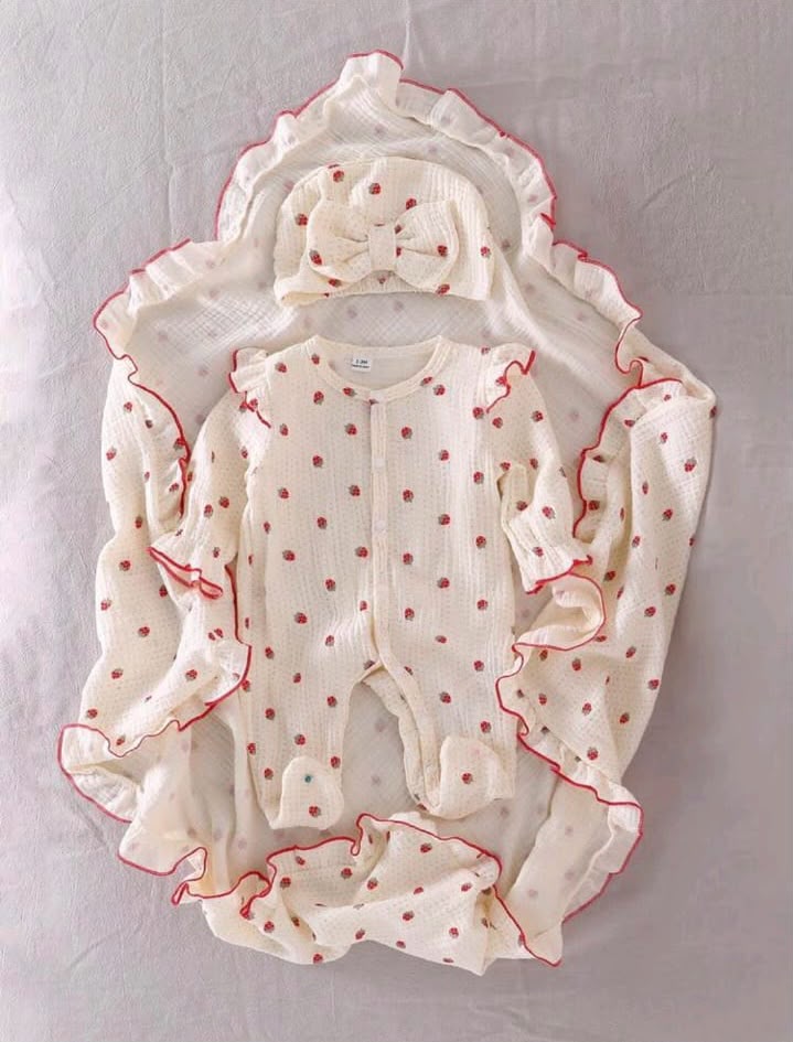 Swaddle , romper and cap set