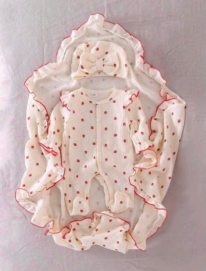 Swaddle , romper and cap set