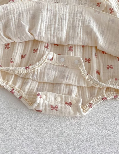 The Coral Bow Muslin Romper