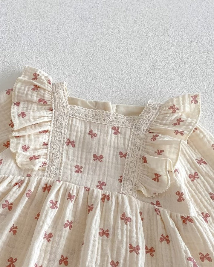 The Coral Bow Muslin Romper
