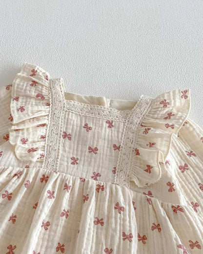 The Coral Bow Muslin Romper